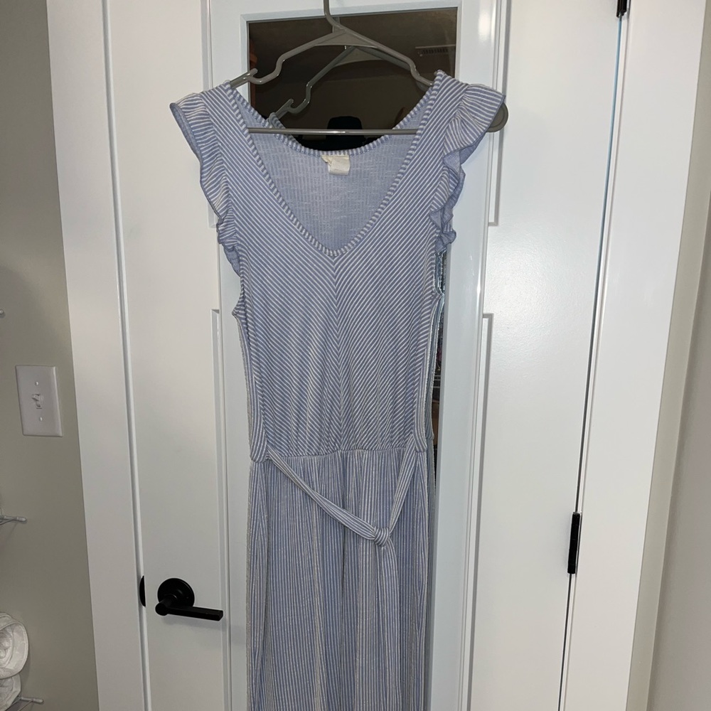 Jumpsuit striped light blue and white with ruffle sleeve